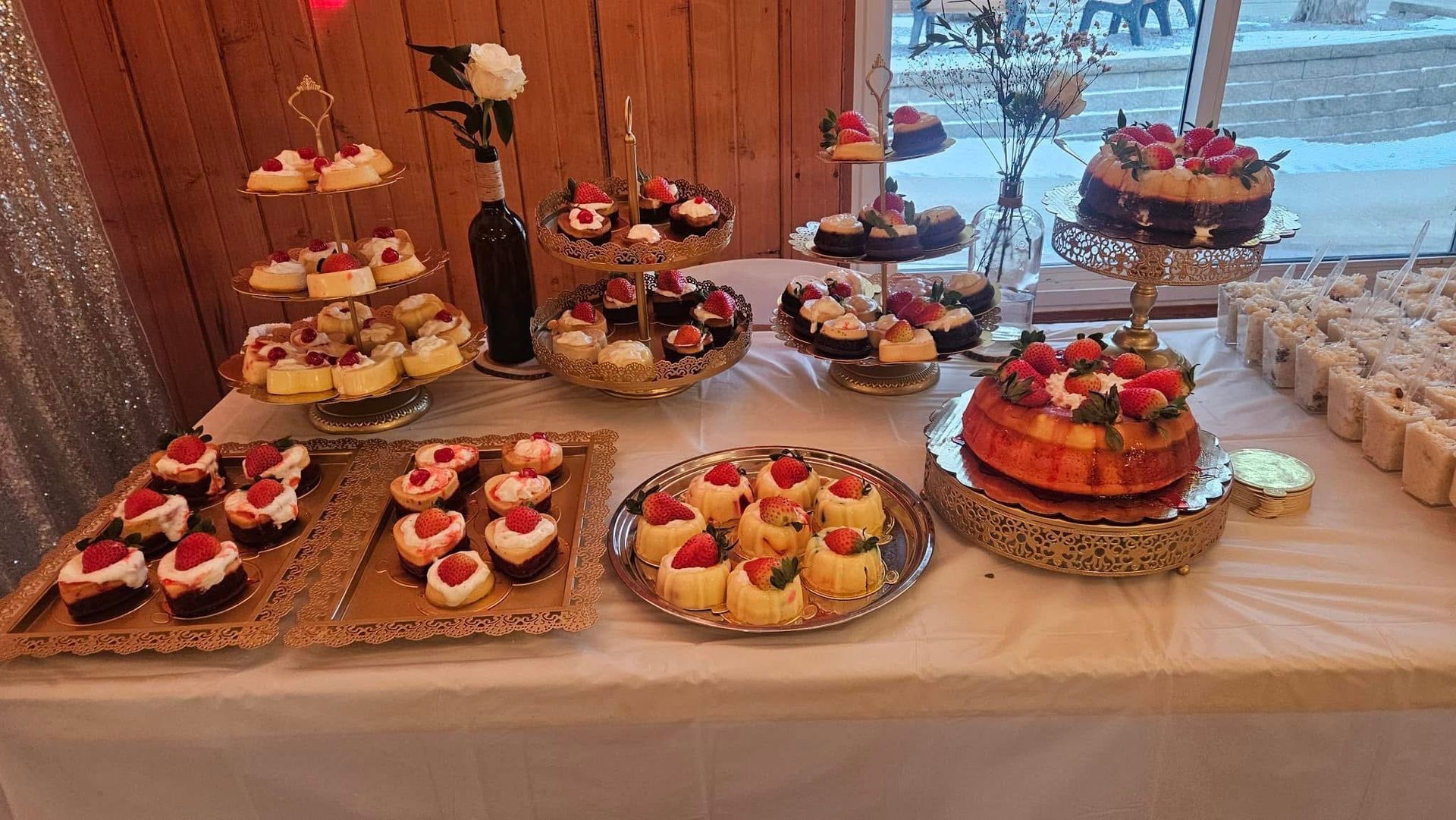 There are many different types of desserts on the table.