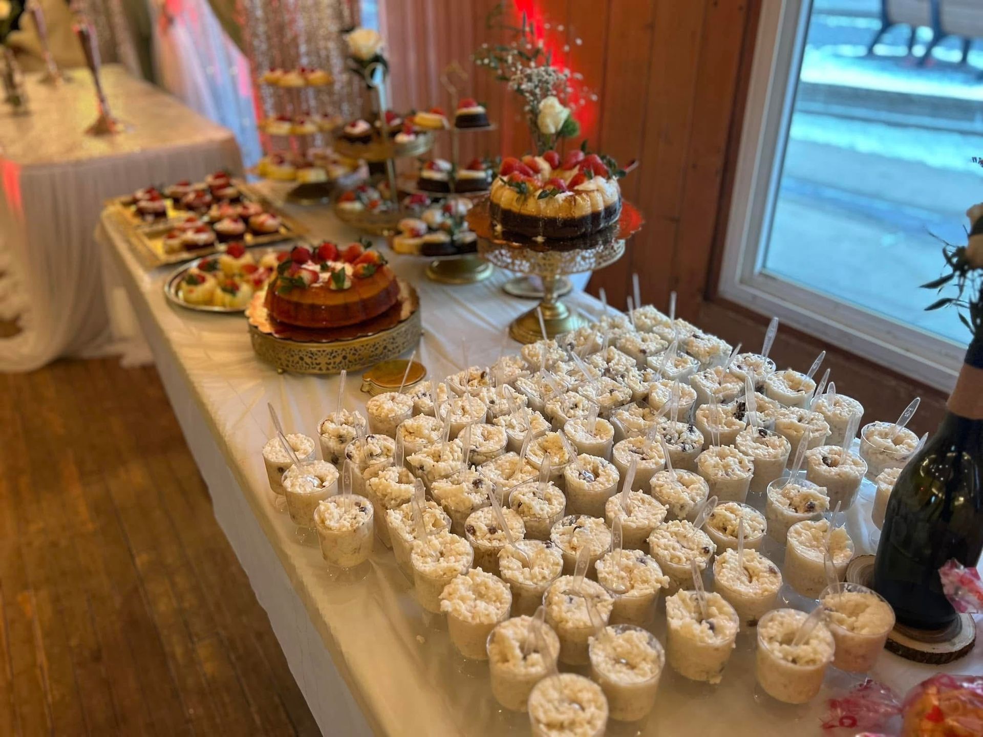 A table topped with a variety of desserts and cupcakes.