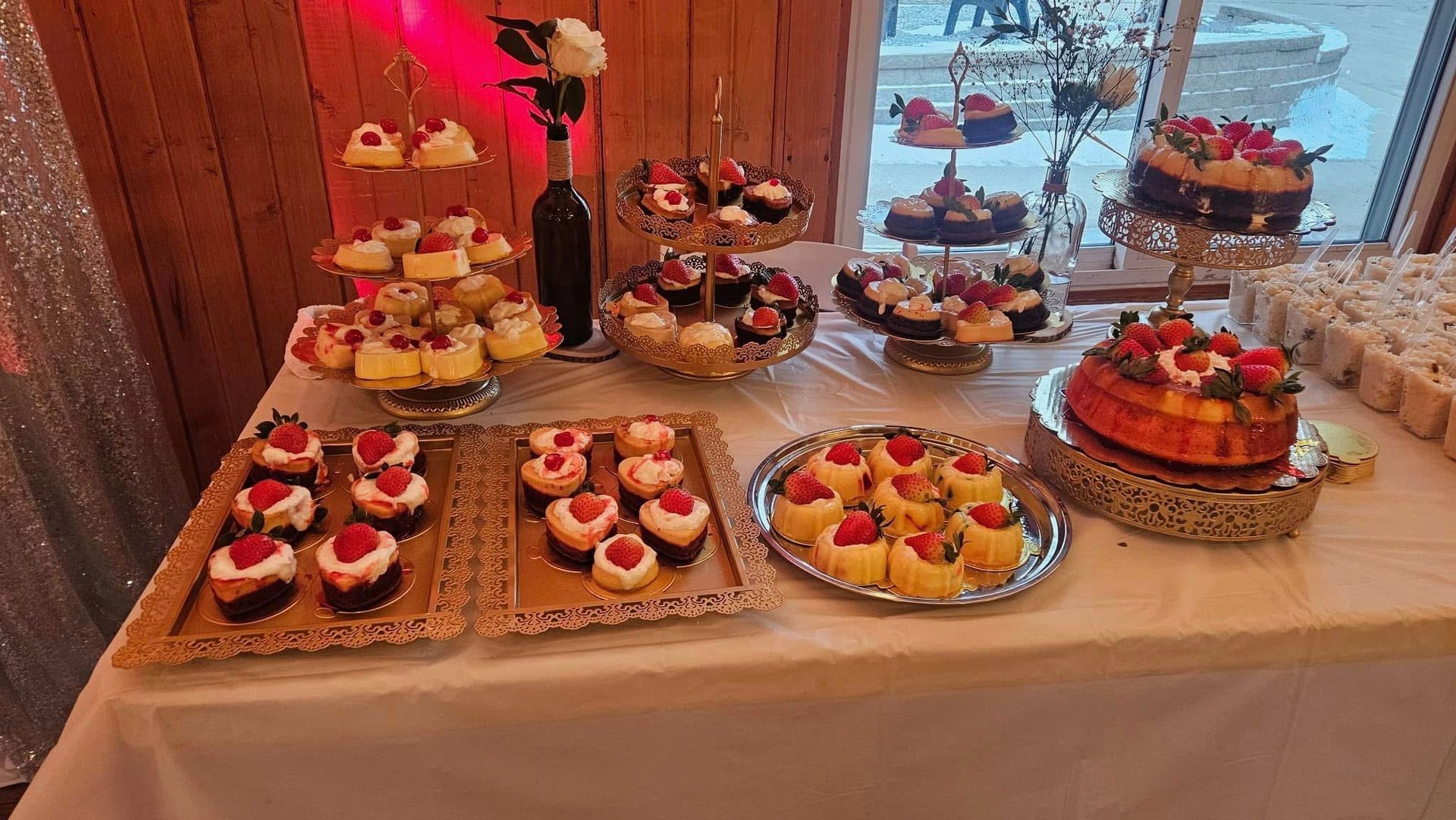 There are many different types of desserts on the table.