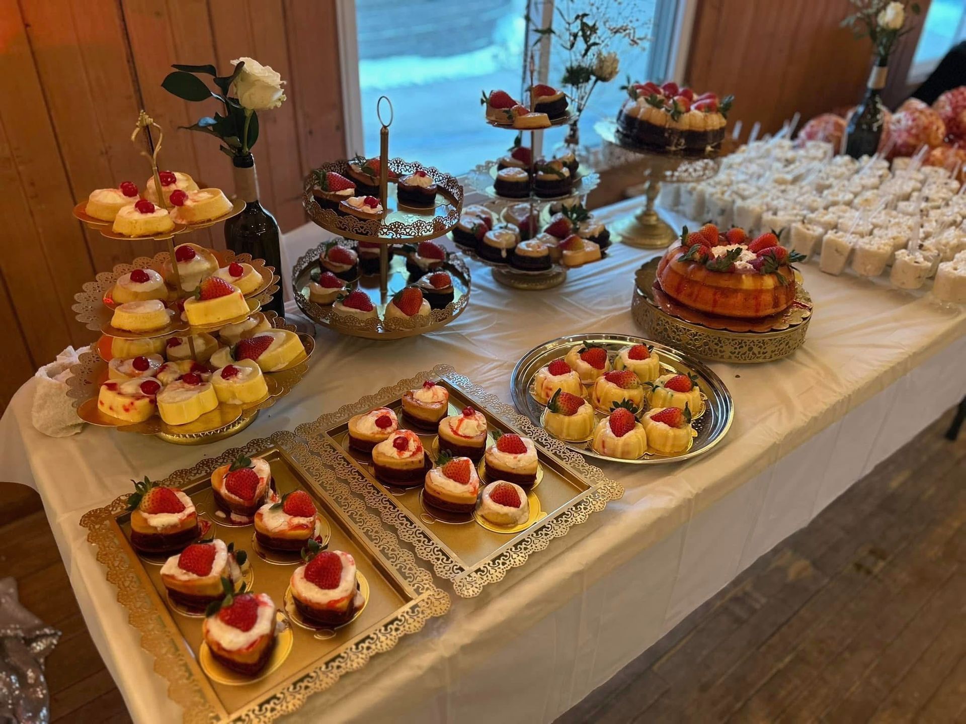 There are many different types of desserts on the table.