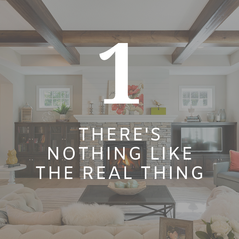 Living room interior with text overlay: “1 THERE’S NOTHING LIKE THE REAL THING”