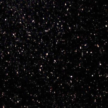 Dense star field on a black background, with many small white and pink points of light