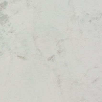 Close-up of a light gray marble or stone surface with subtle veining and faint spots