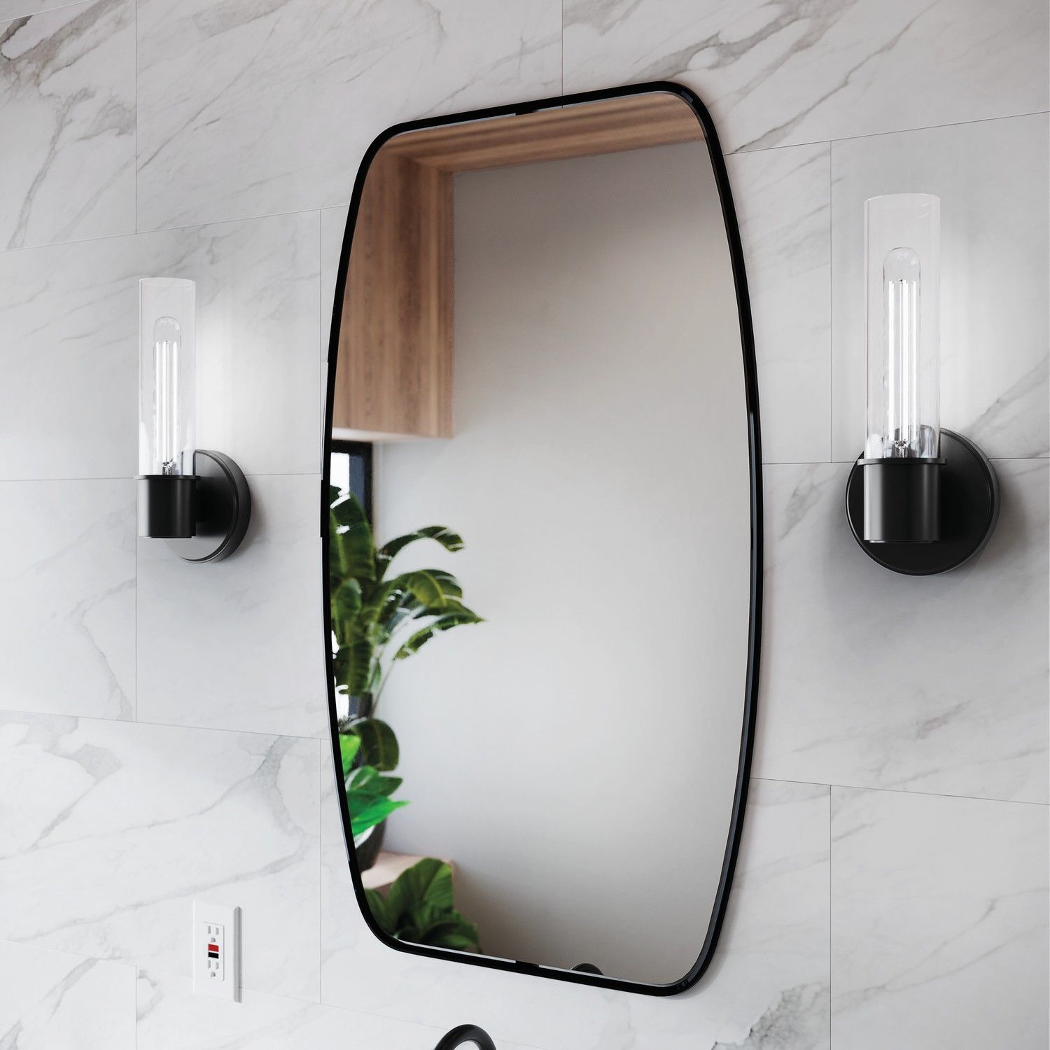 Modern bathroom mirror with black sconces on a marble-tiled wall, reflecting a plant and curtain