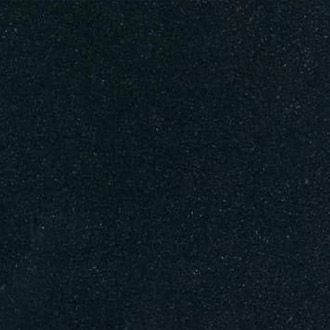 Dark, grainy close-up of a textured black surface with faint blue speckles