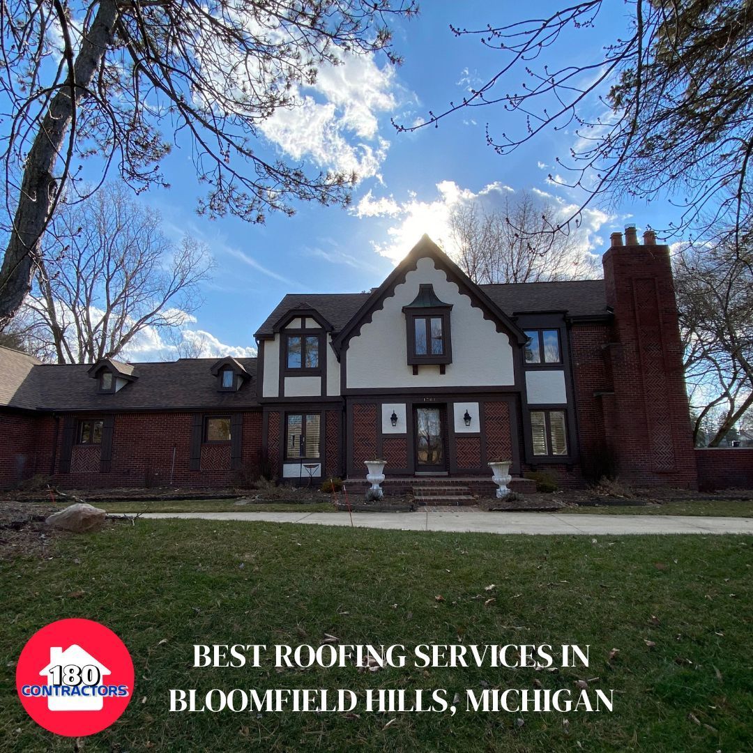 Tudor-style brick house under a blue sky with the text “Best Roofing Services in Bloomfield Hills, Michigan”