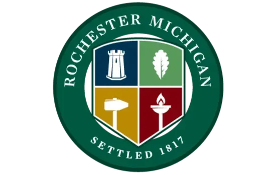 City seal of Rochester, Michigan, with green ring and a four-quadrant shield; “Settled 1817” text.