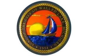 Seal of the City of Walled Lake, Michigan, with sailboat, sunset, and city name around the border