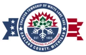 Chamber of Commerce logo for White Lake Township, Oakland County, Michigan, with red, white, and blue maple leaf emblem