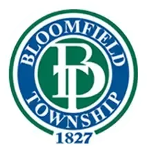 Bloomfield Township seal with green and blue circular logo and “1827” text