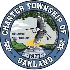 Charter Township of Oakland seal with heron, tree, hills, river, and “Curaum Terram,” dated 1827.