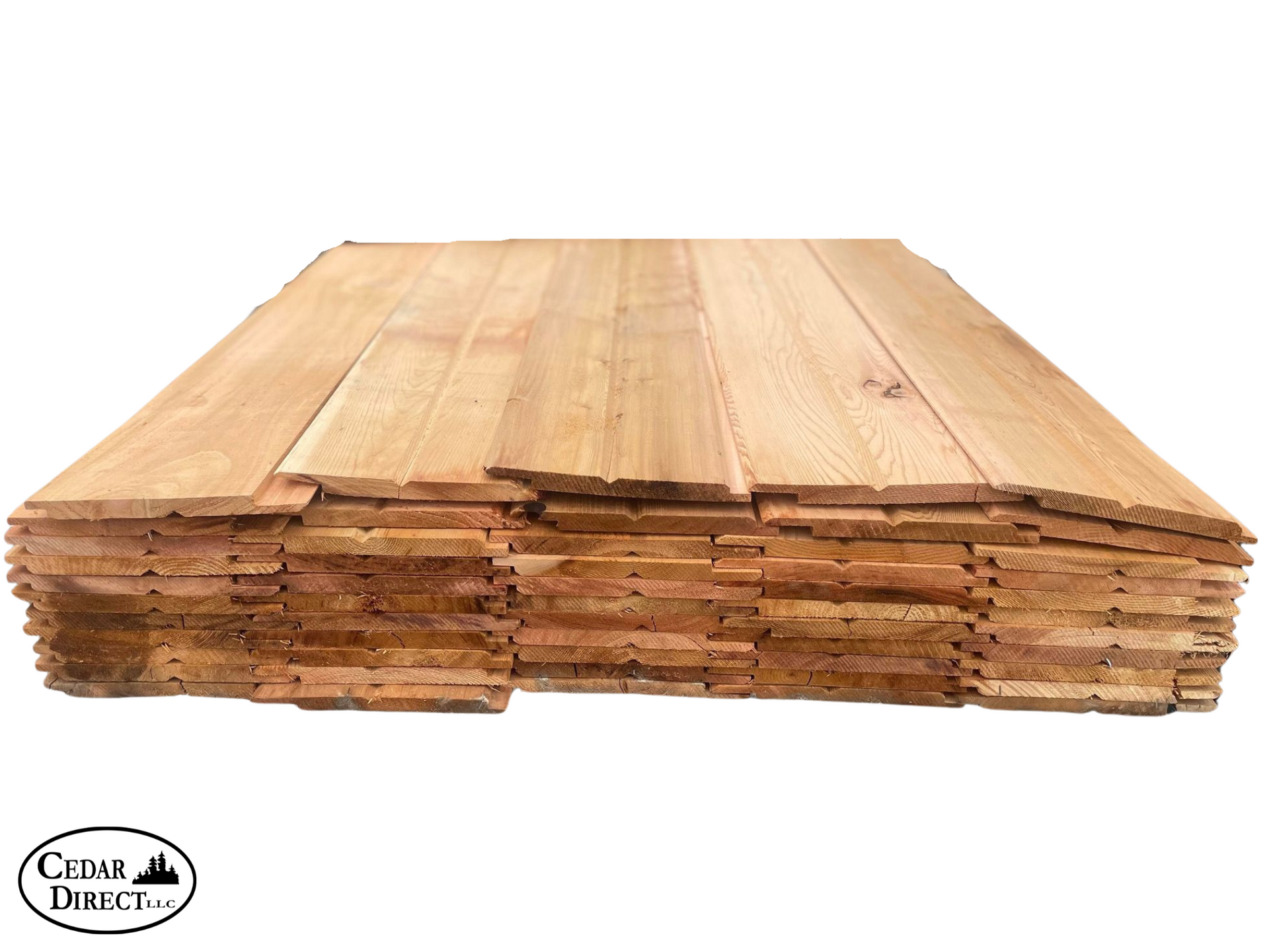 A stack of wooden boards with the word cedar on it
