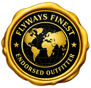 Gold seal logo with black globe and text “FLYWAYS FINEST ENDORSED OUTFITTER”