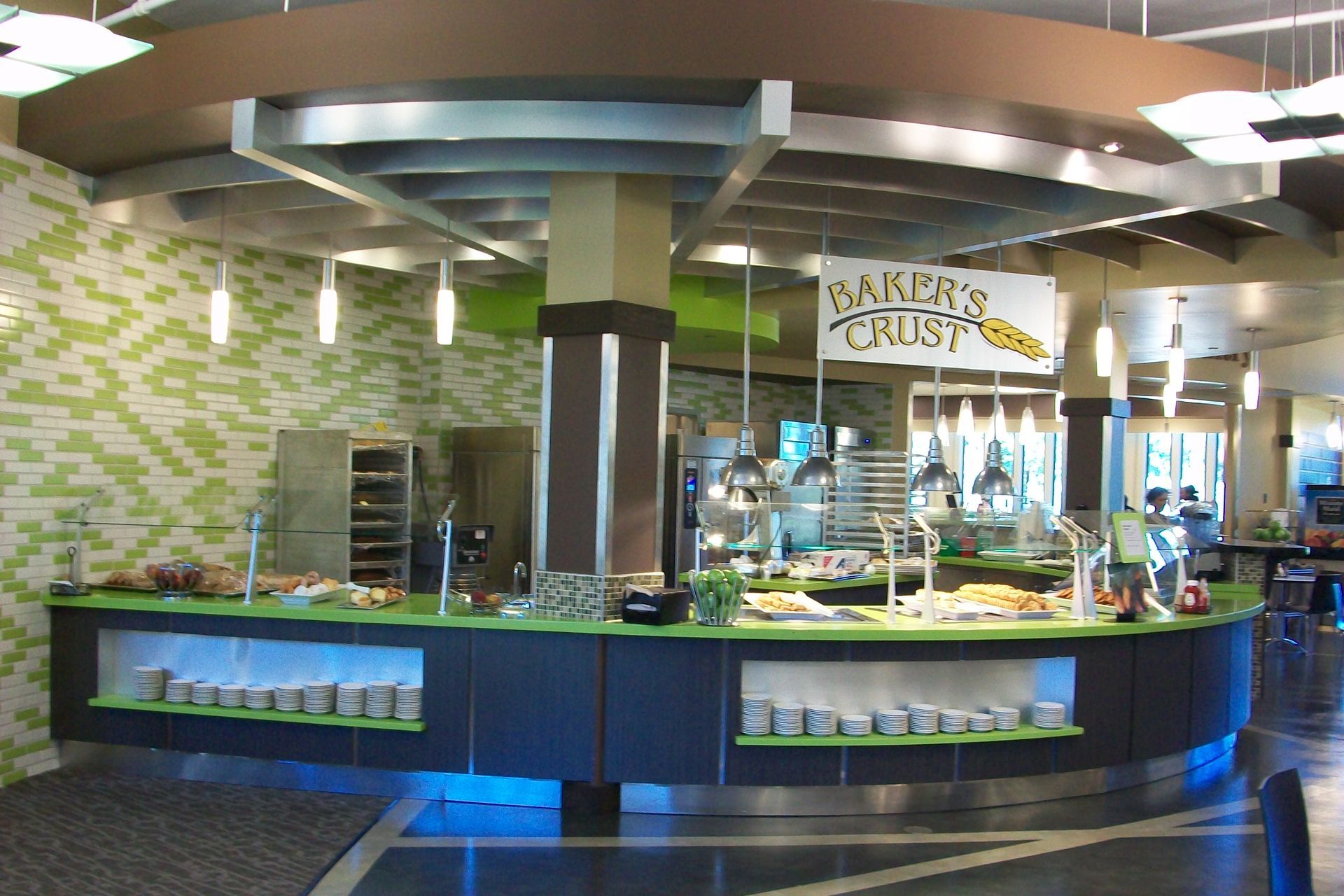 A curved buffet station with a 