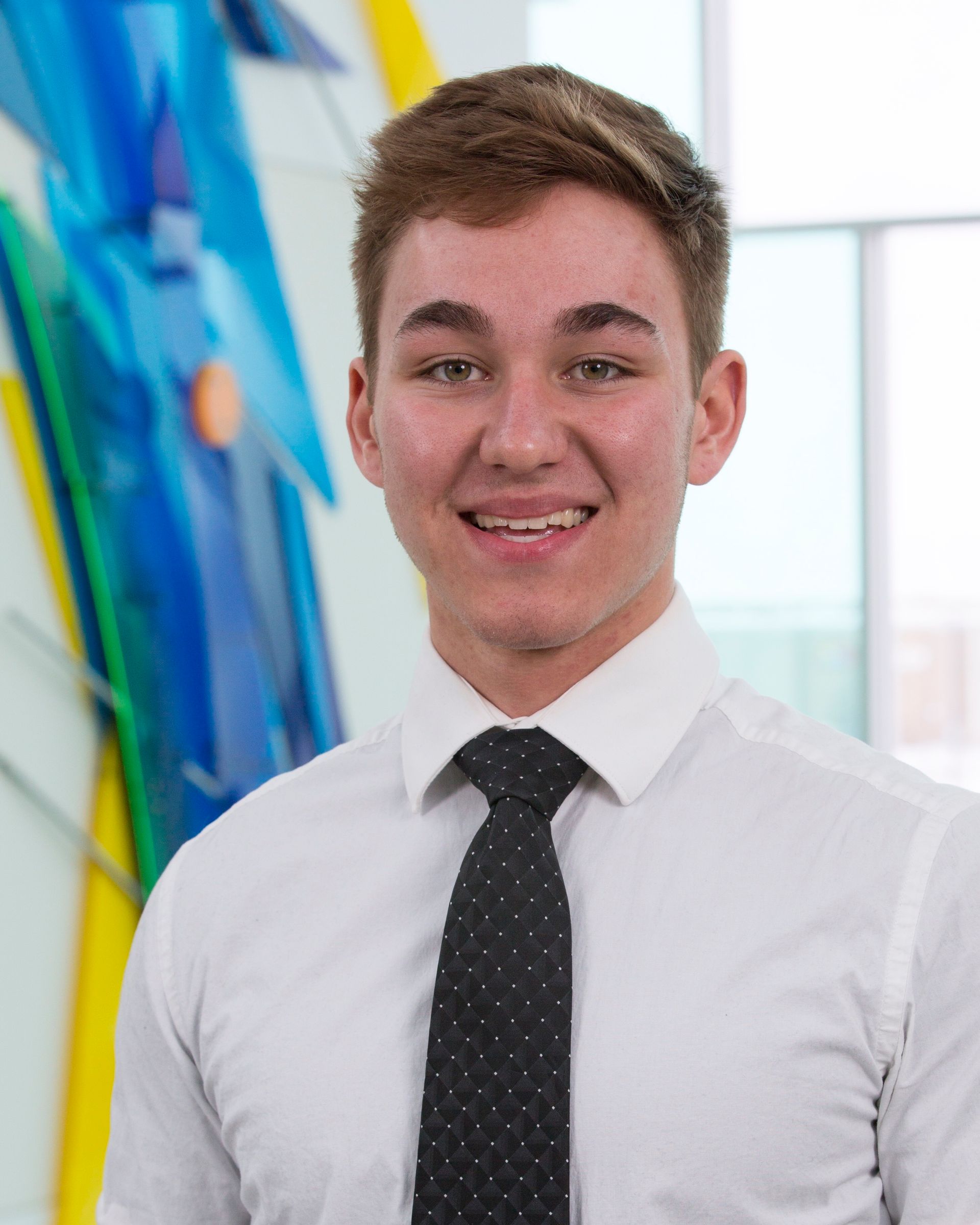 A headshot of Mack Mundy, an ERP implementer at SuiteDynamics.
