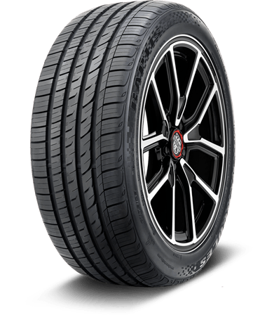 Black alloy wheel with a low-profile tire on a white background