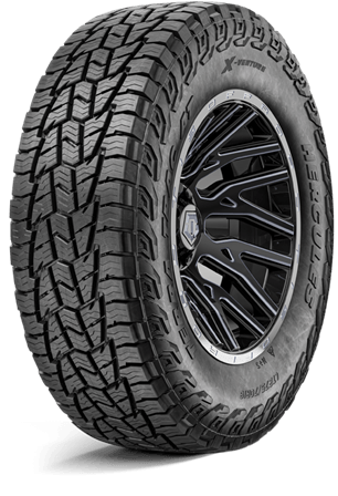 Black off-road tire with rugged tread on a black alloy wheel, isolated on white background