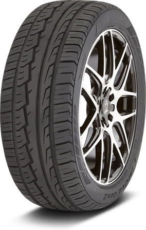 Black car tire mounted on a chrome alloy wheel, isolated on a white background