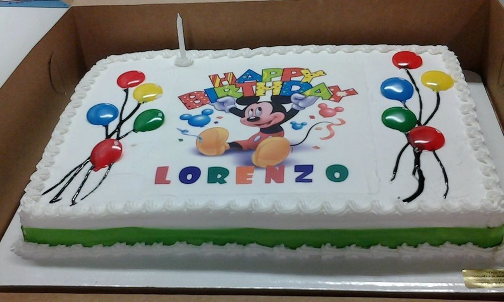 Birthday cake with Mickey Mouse graphic and 