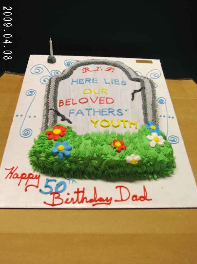 Cake in the shape of a tombstone with 