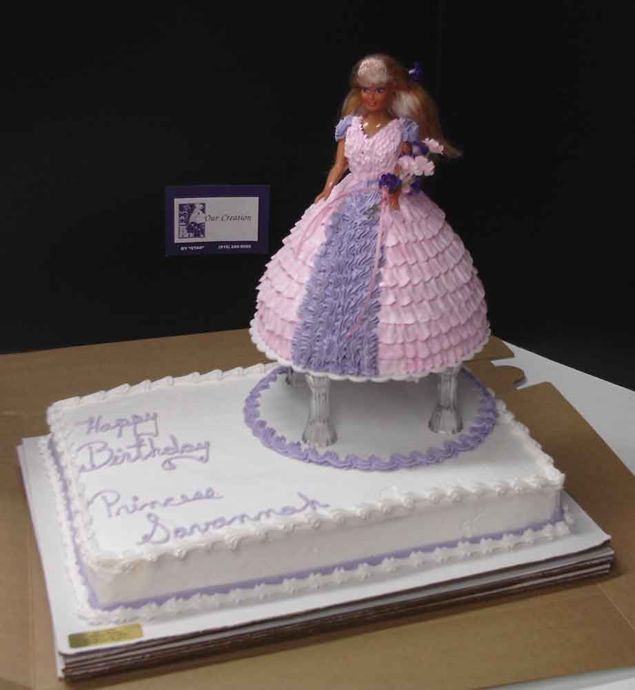 Birthday cake with Barbie doll princess, pink and purple frosting, white base, 