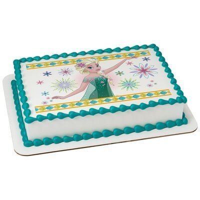 Cake decorated with Elsa from Frozen and teal frosting.