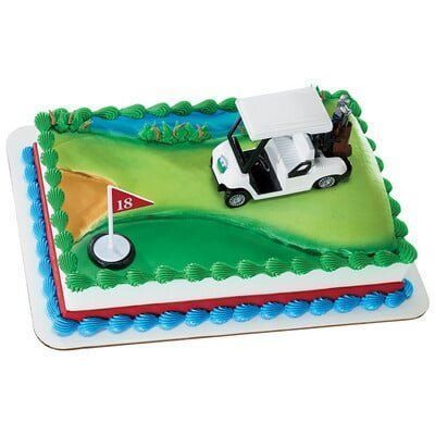 Golf-themed birthday cake with golf cart, flag, and green frosting.