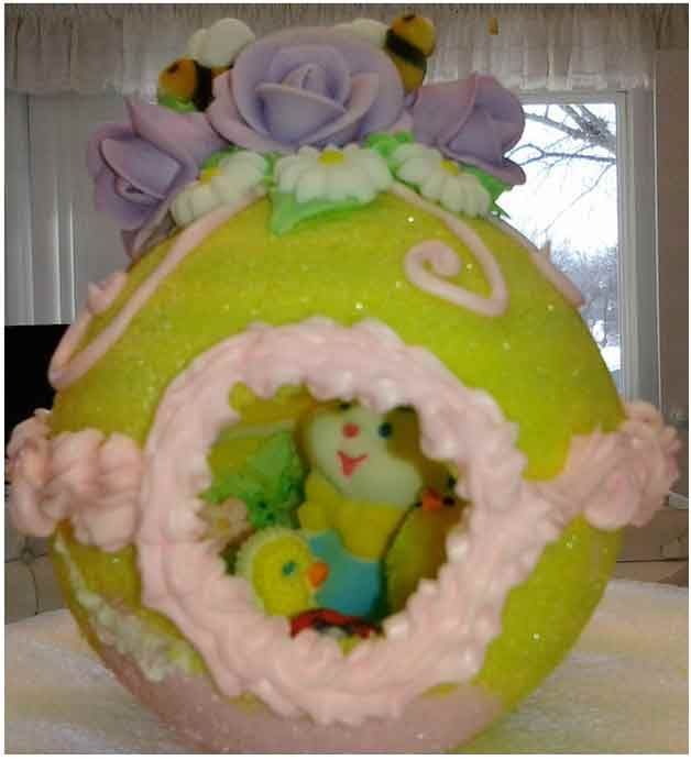 Easter egg decoration with a bunny and chick inside, lavender roses and bees on top.