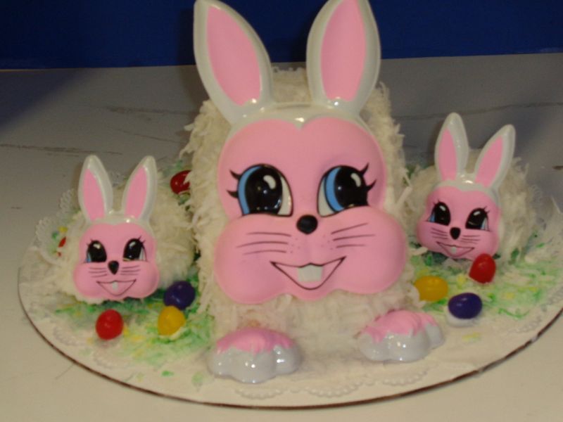 Easter bunny cake with pink features and coconut 