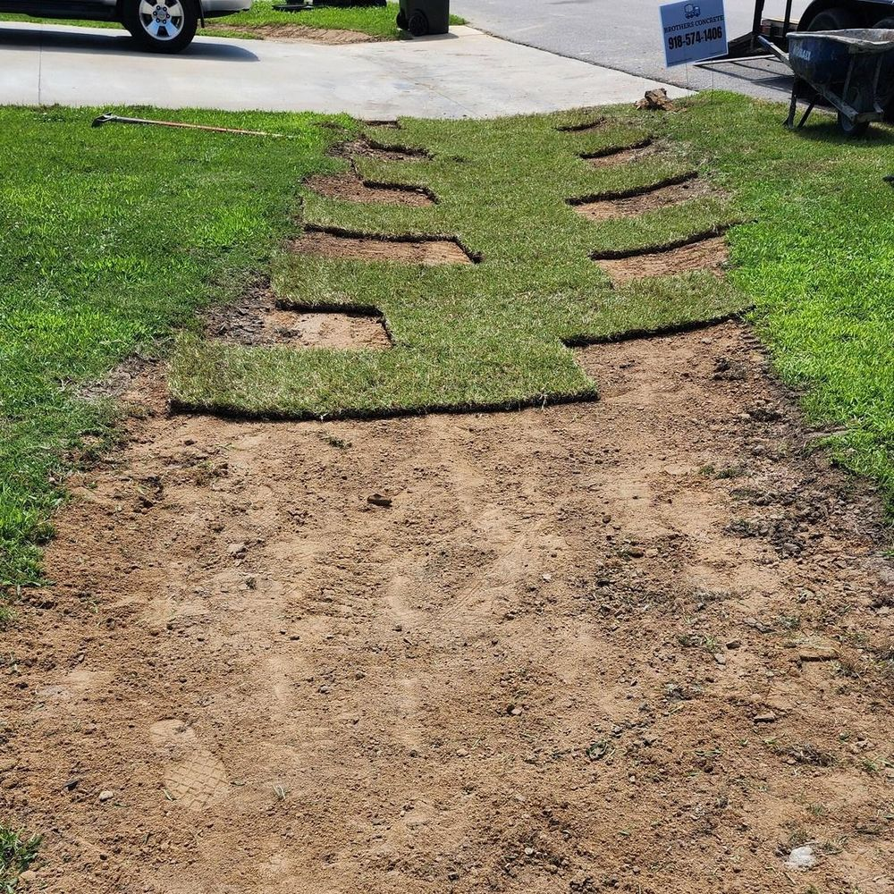 A lawn with a sign that says ' lawn care ' on it