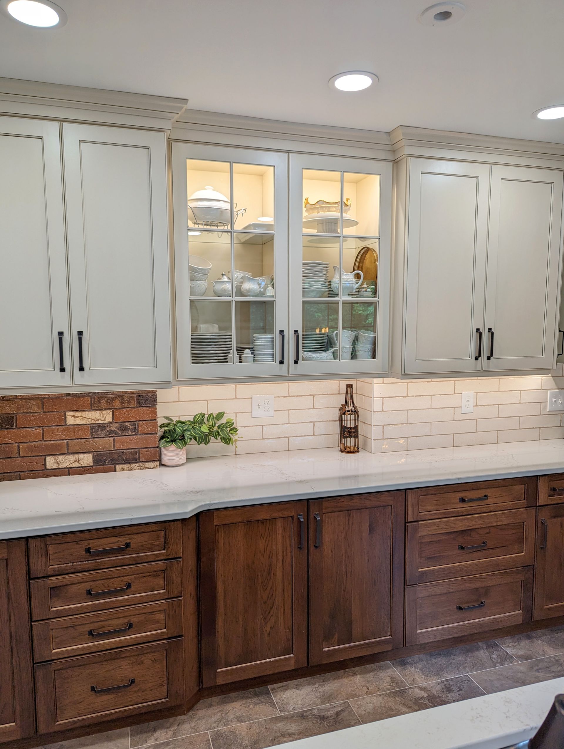 Two-tone kitchen remodel with painted and stained cabinets