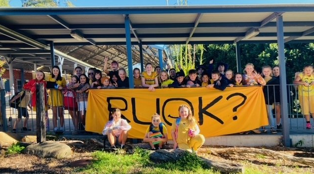 Milton Public students with an R U OK? banner