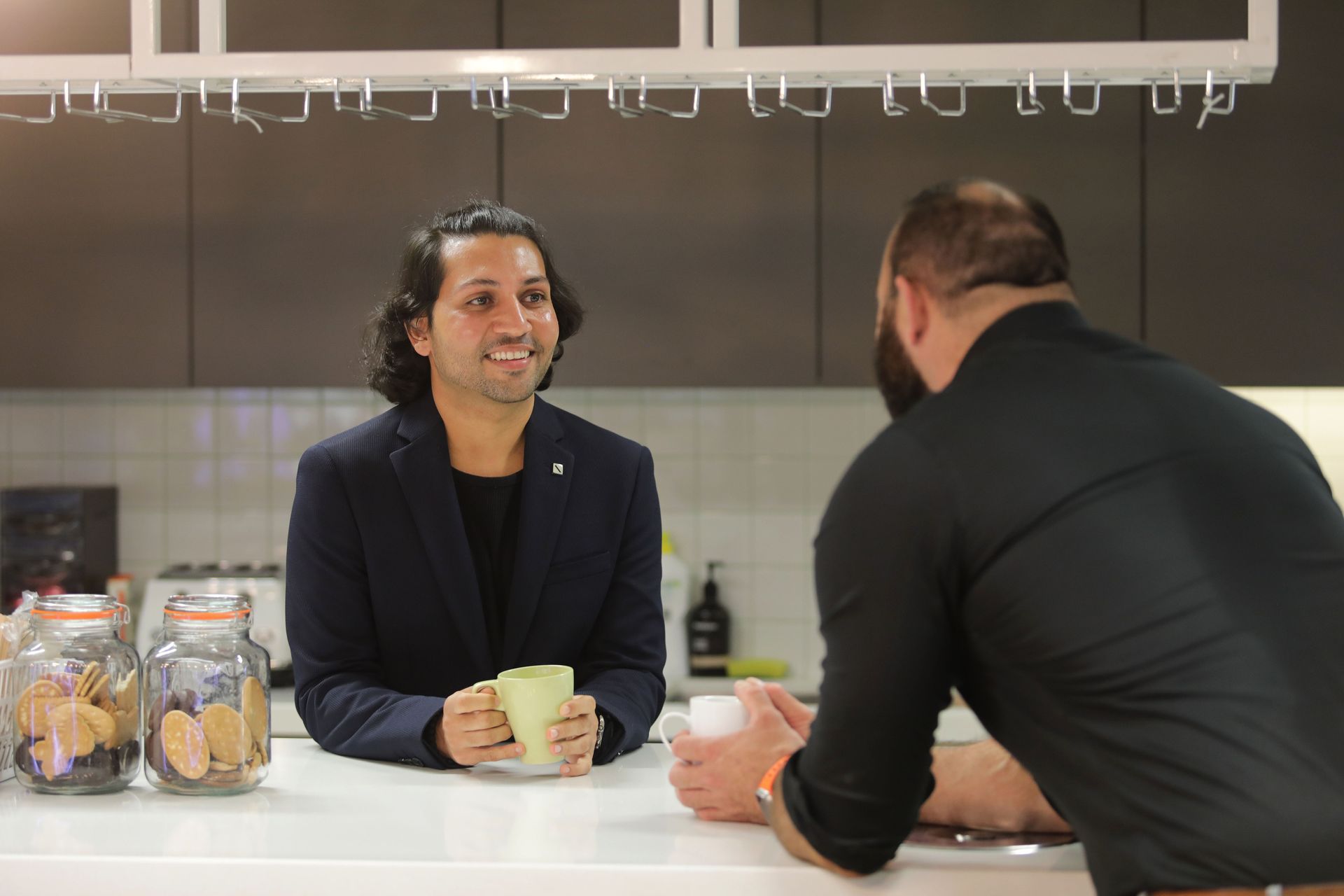 Man and woman talking in an office