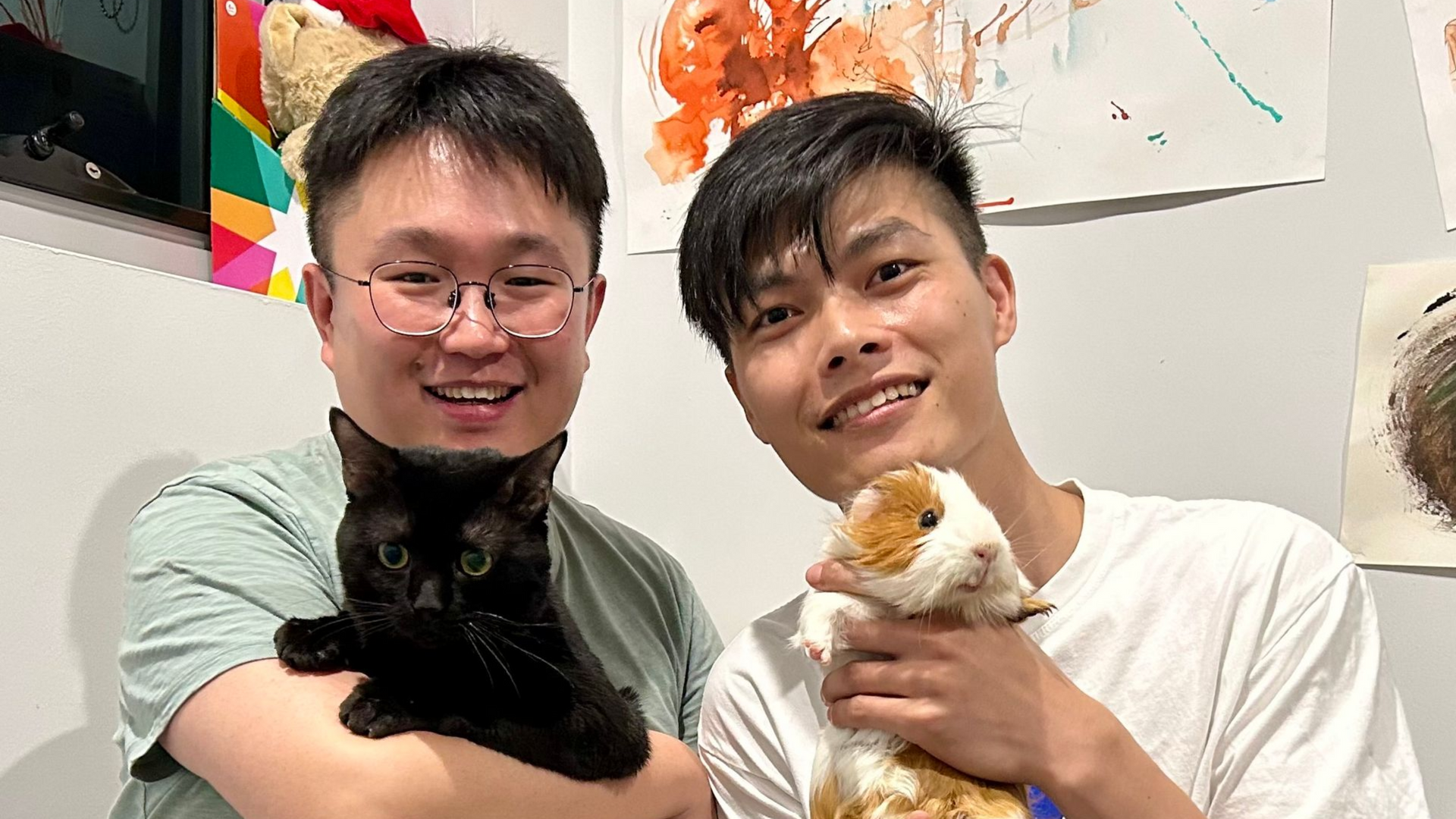 Oliver with his husband.