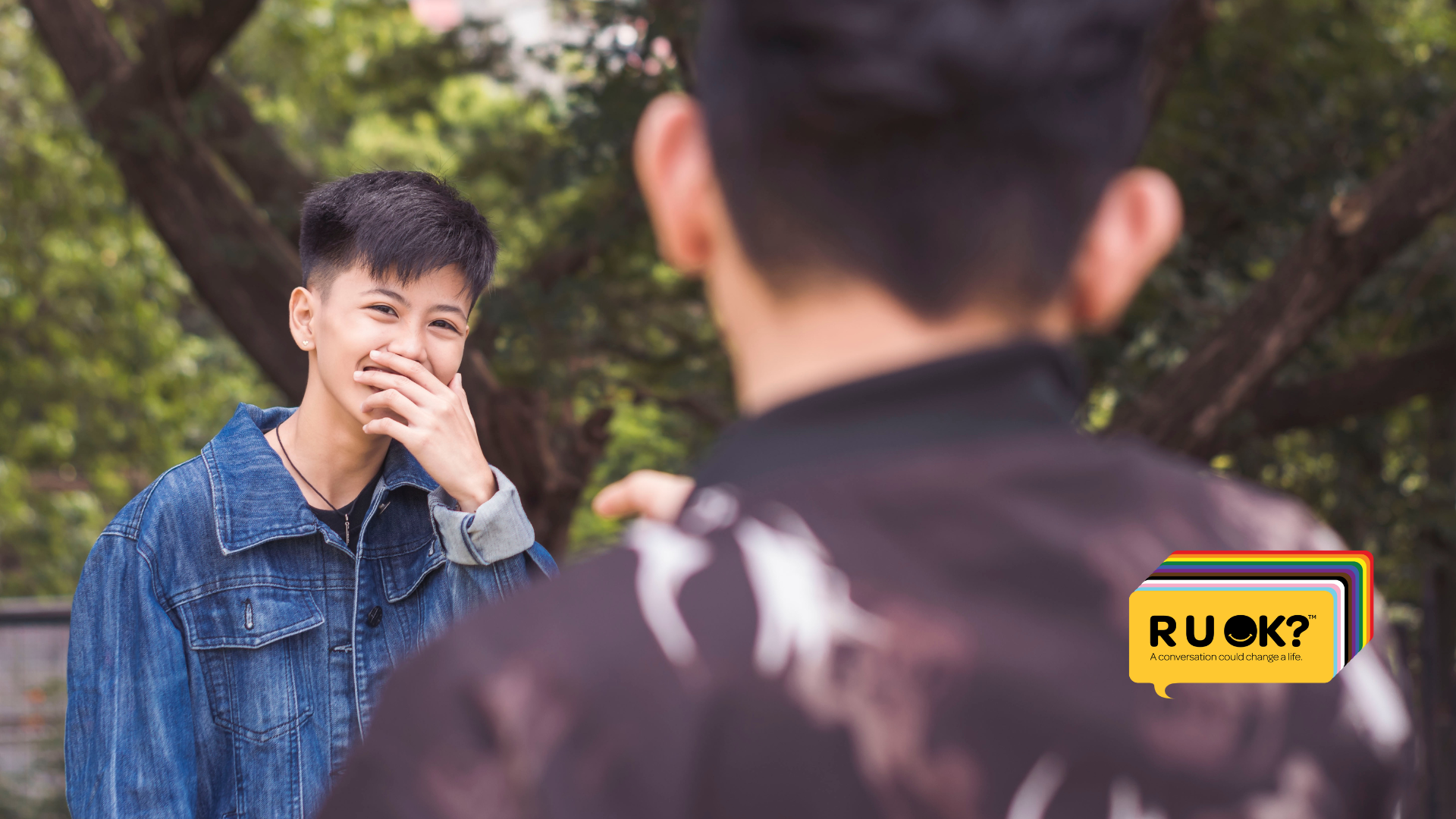 Two young people in conversation.