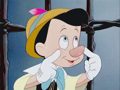 A close up of a cartoon character with his hands on his face