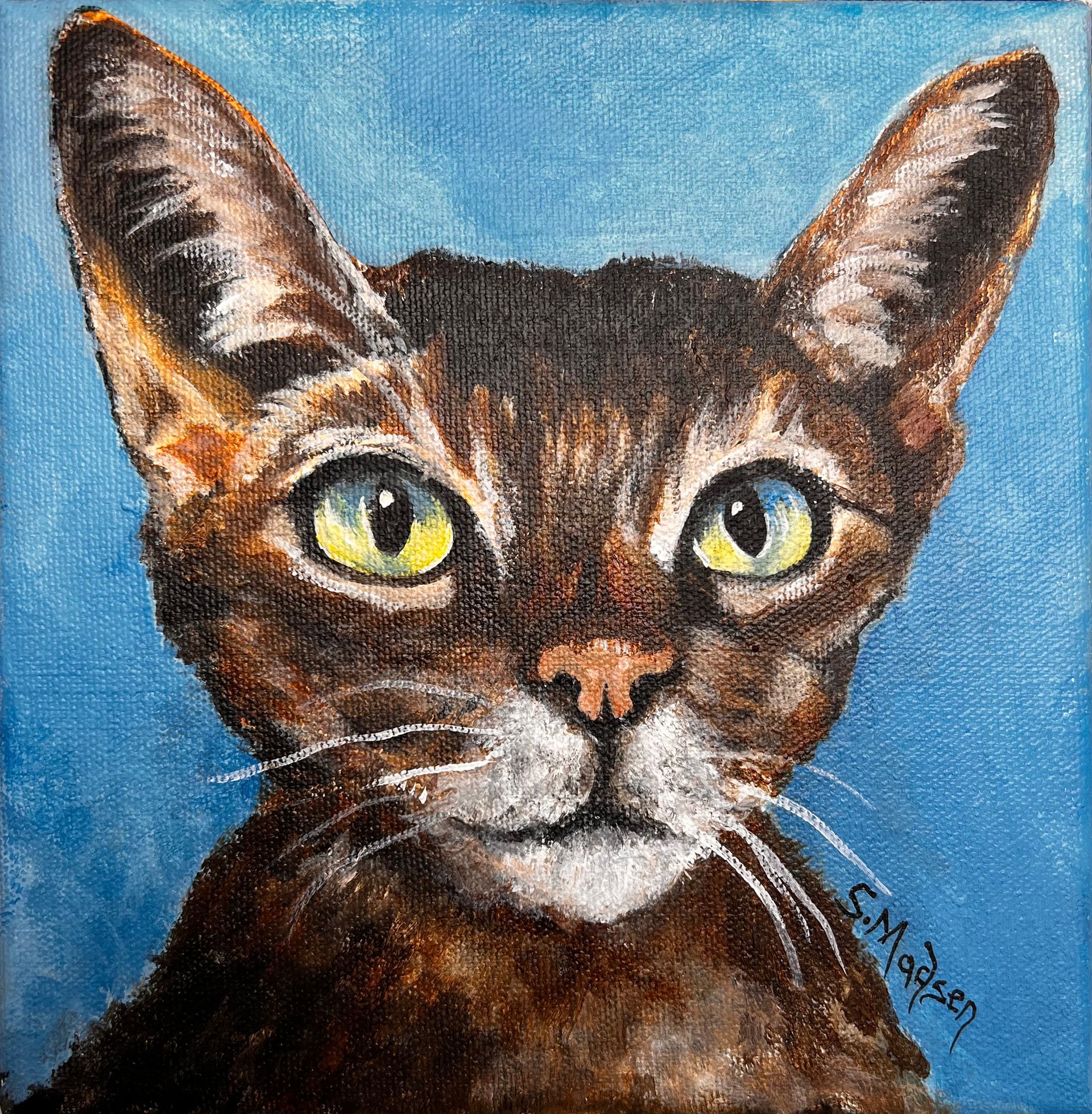 A painting of a brown cat with green eyes on a blue background.