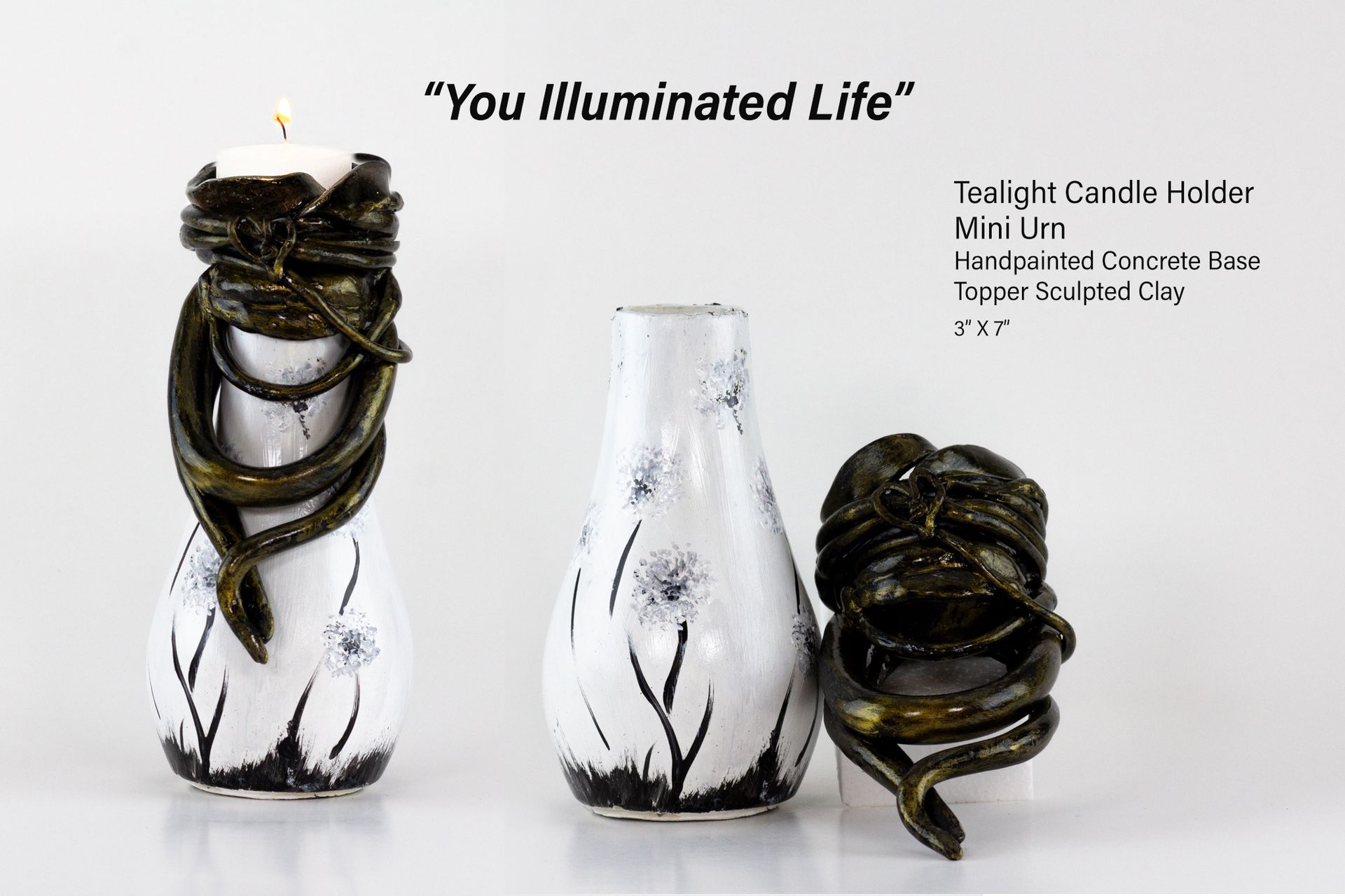 A candle holder with a snake wrapped around it