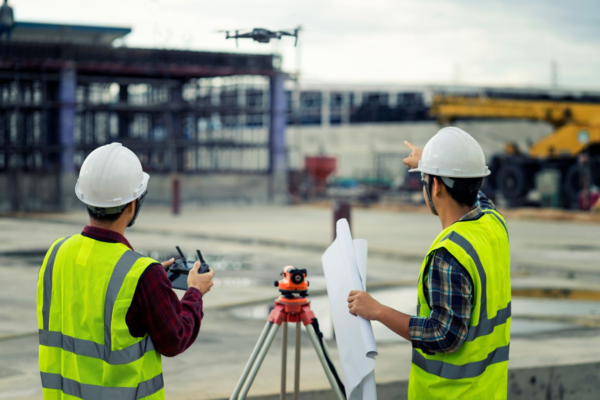 Civil engineering flying drone over construction site survey for land and building project. Civil engineering flying drone over construction site survey for land and building project.