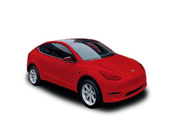 Red electric car in three-quarter front view on a white background