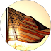 American flag waving against a clear sky