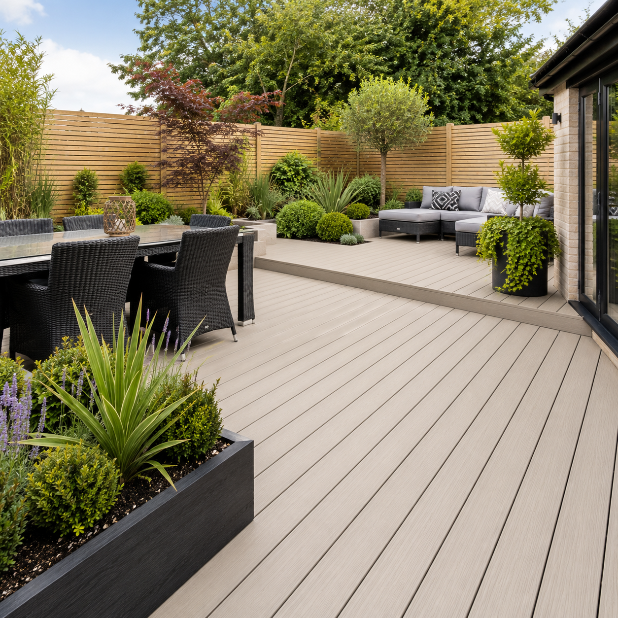 A man is installing a wooden deck with a drill.