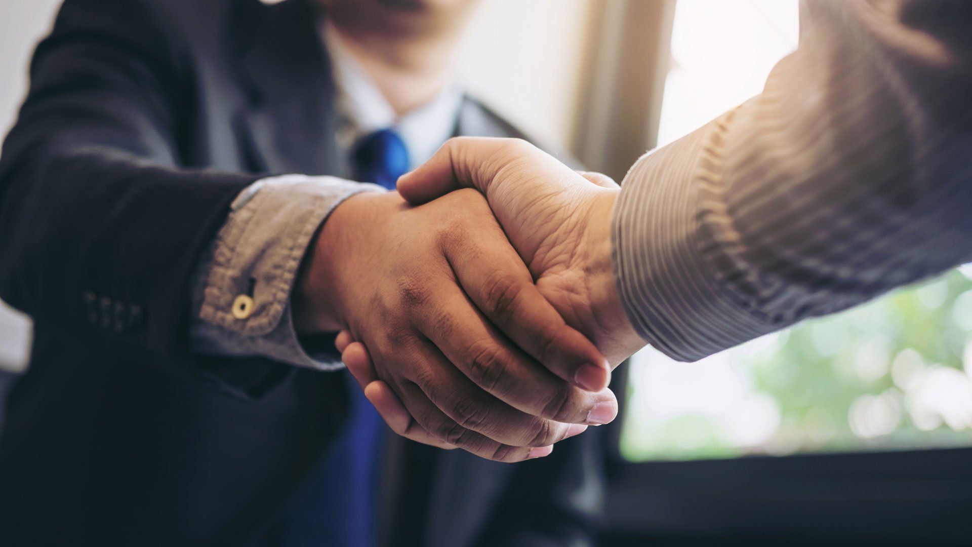 Business Handshake — Yorkville, IL — Dain Conway’s Tax Service