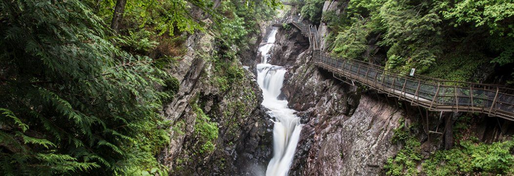 Deep Gorge flowing alongside a wooden walkway located in Wilmington, NY