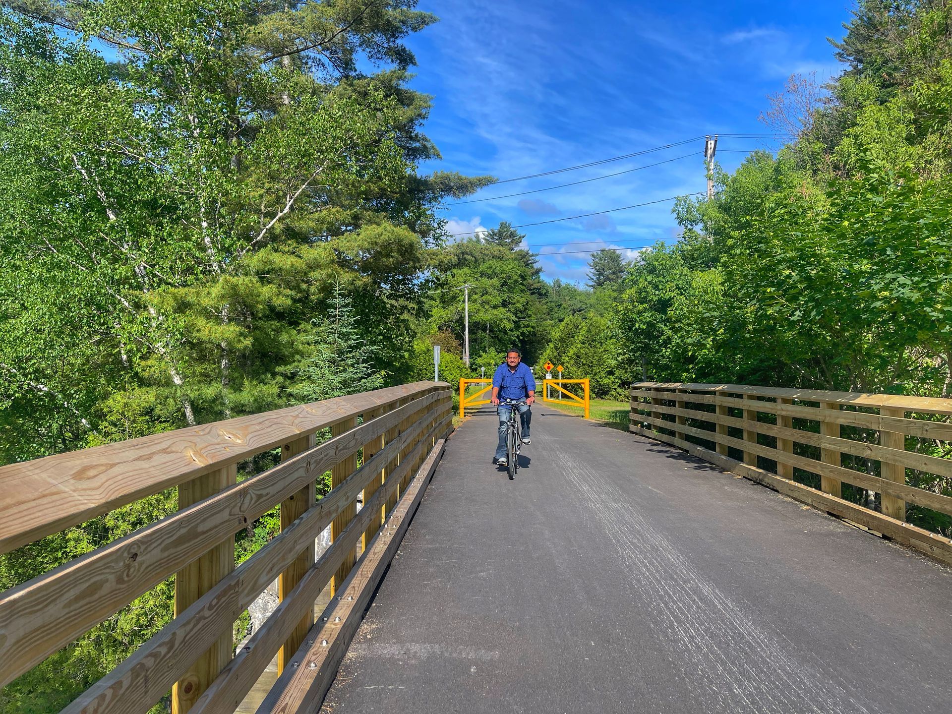 View of cyclist on Adirondack Rail Trail 