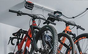 Bike/jeep top motorized garage overhead storage rack .