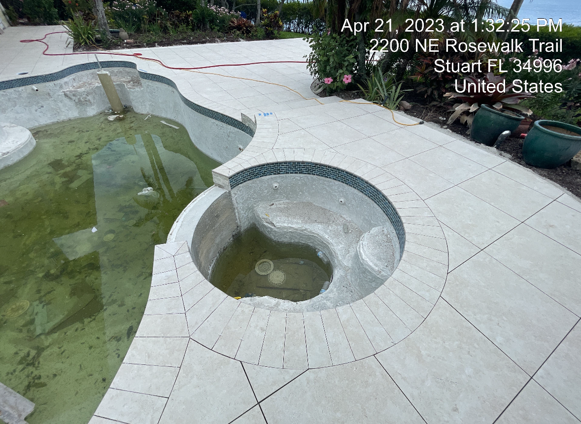 A swimming pool with a hole in the middle of it