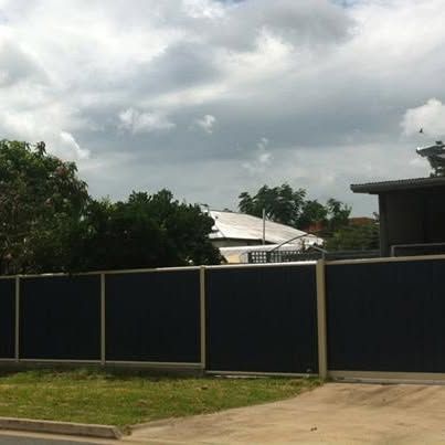 Dark Fence in Front of a House, Under a Cloudy Sky — The Fence Place in Kawana, QLD