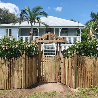 Light Blue House With White Trim, Porch, and Picket Fence — The Fence Place in Kawana, QLD