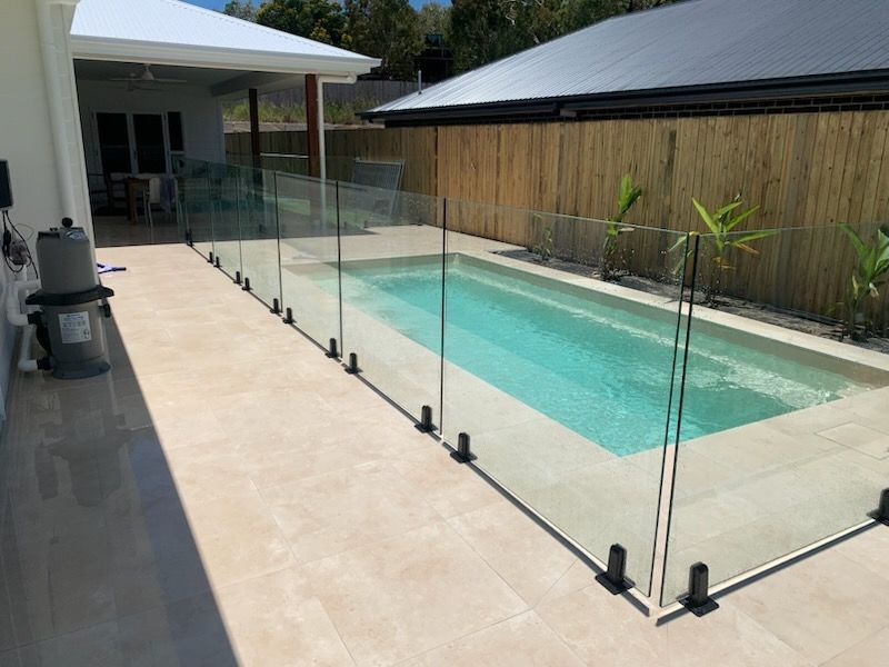 Glass Pool Fence Surrounding Rectangular Pool — The Fence Place in Kawana, QLD